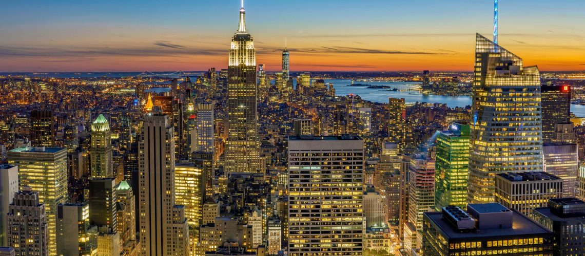 new-york-cityscape-with-lighted-up-skyscrapers